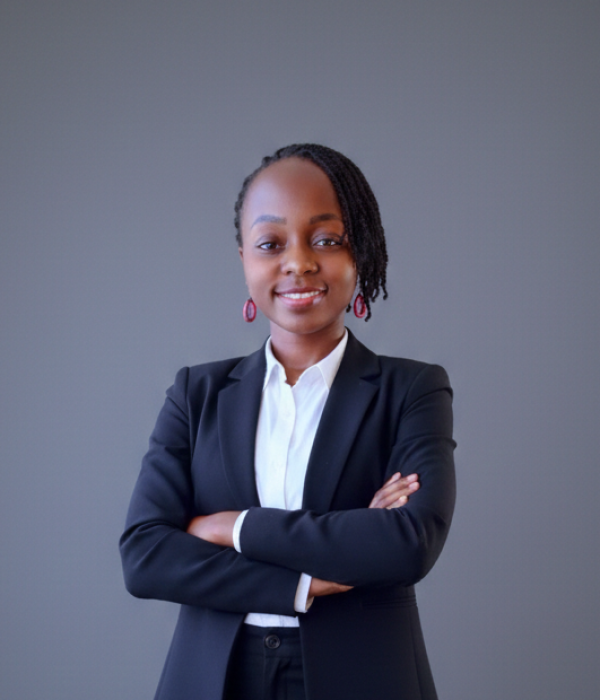Mary Usaji In a suit